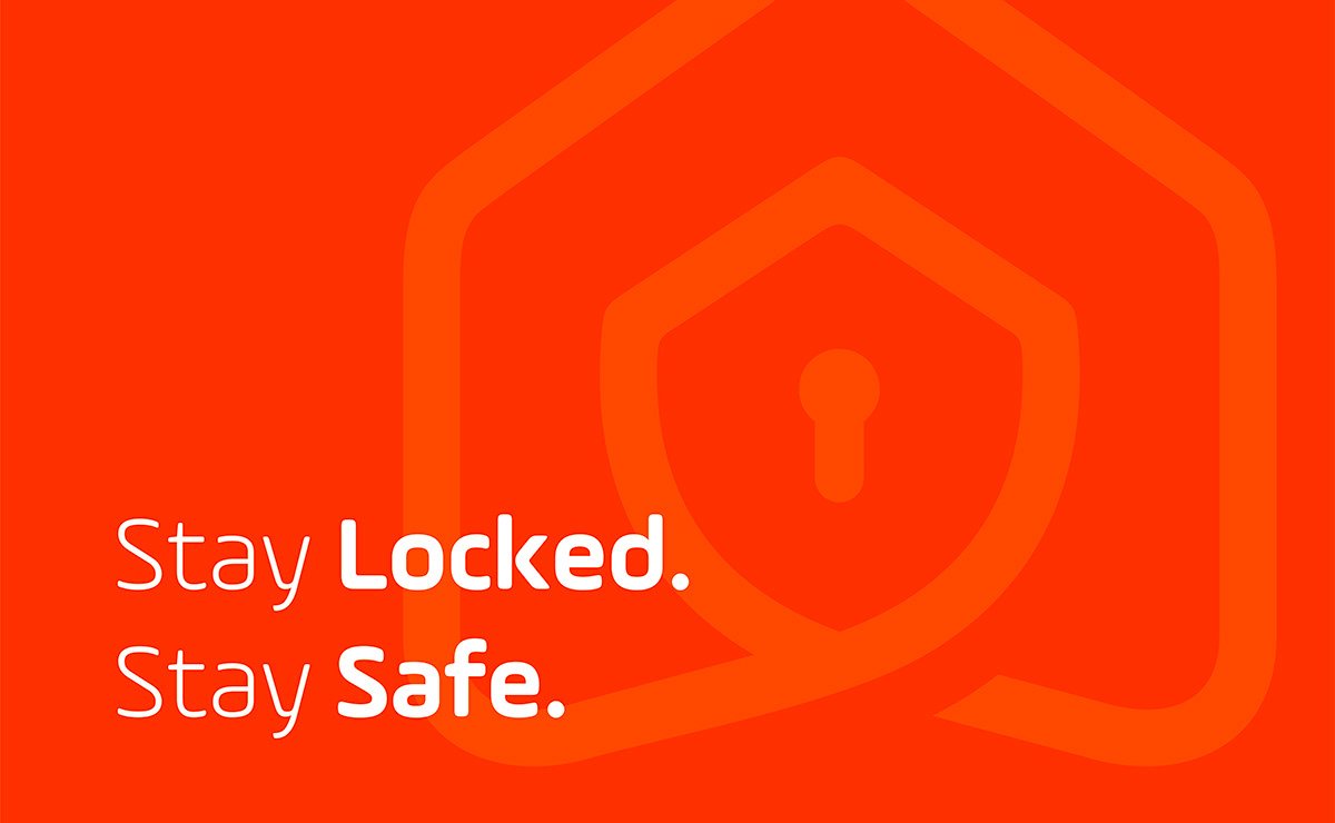 Stay Locked safety awareness graphic with lock symbol on orange background.