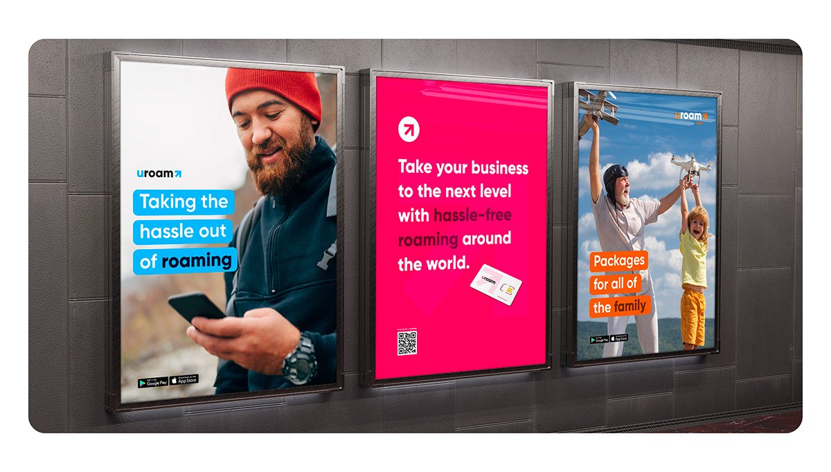 Man using phone, family enjoying time, and roaming business ad posters.