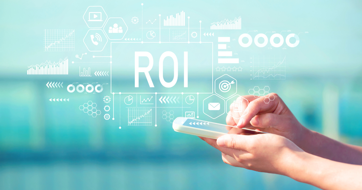 Hands holding a smartphone with digital ROI and marketing analytics icons displayed, symbolising data-driven video marketing results.